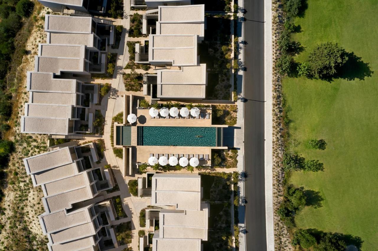 Minthis Resort Tsadha Zewnętrze zdjęcie Aerial view of the hotel